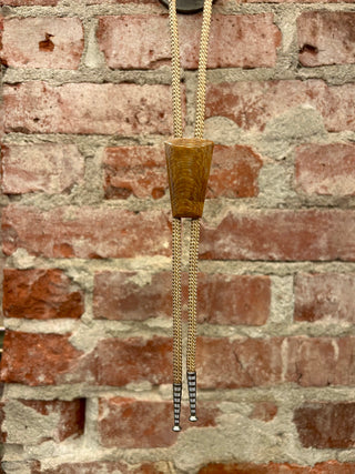 Petrified Wood Emblem Bolo Tie